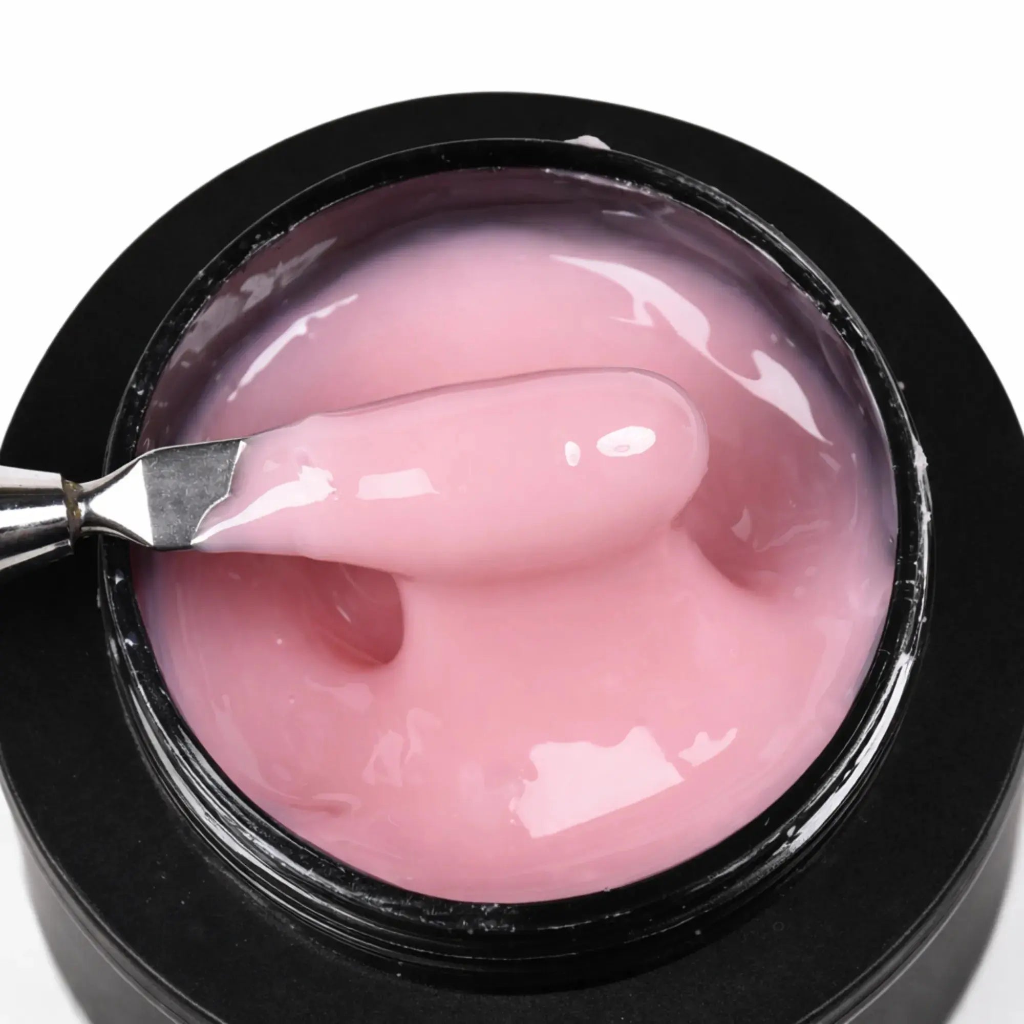 Gel de Construction Cotton Candy Beauty Distribution, builder gel rose bonbon épais et brillant en pot, texture auto-égalisante sur spatule, rendu packshot luxe pour manucure professionnelle, gainage et extension d’ongles.