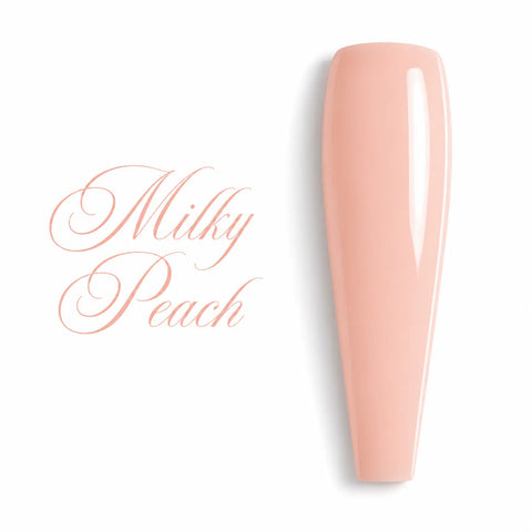 Capsule d’ongle ballerine longue couleur Milky Peach, vernis gel pêche laiteux pastel ultra brillant sur fond blanc, visuel professionnel pour manucure et nail art.