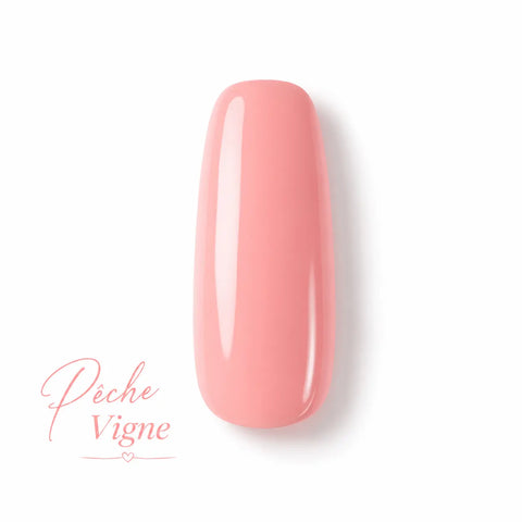 Vernis gel Pêche Vigne Beauty Distribution, teinte pêche rosée effet glossy, capsule couleur sur fond blanc pour manucure professionnelle UV/LED.
