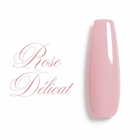 Capsule d’ongle ballerine longue en vernis gel Rose Délicat, rose laiteux pastel légèrement translucide, finition ultra brillante et crémeuse, visuel professionnel pour manucure UV LED et nail art.