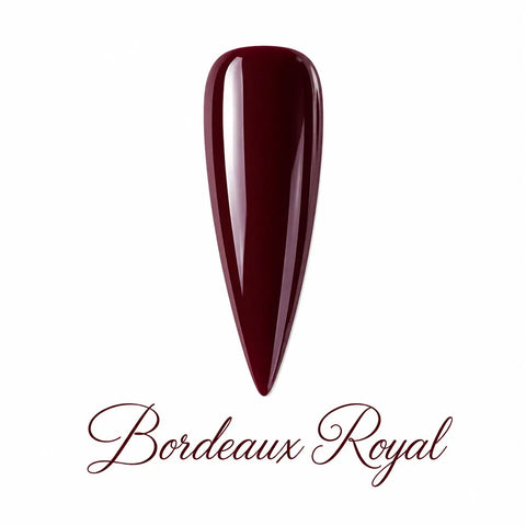 Capsule stiletto Bordeaux Royal Beauty Distribution, vernis gel bordeaux profond brillant, finition glossy élégante, rendu packshot luxe sur fond blanc pour manucure professionnelle et nail art.