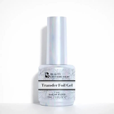 Transfer Foil Gel Clear Beauty Distribution 15 ml, gel transparent pour transfert foil nail art, soak-off UV/LED, flacon blanc packshot luxe sur fond blanc pour manucure professionnelle et prothésiste ongulaire.