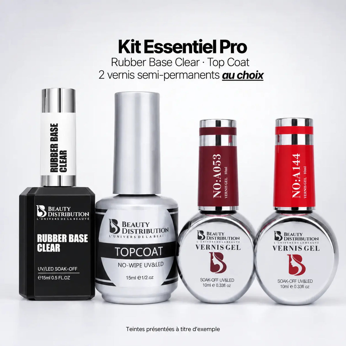 Kit Essentiel Pro Beauty Distribution : Rubber Base Clear 15 ml, Top Coat No-Wipe et deux vernis semi-permanents de 10 ml au choix. Teintes présentées à titre d’exemple.