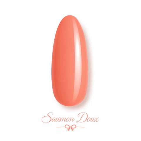 Vernis gel Saumon Doux Beauty Distribution, teinte corail saumonée brillante effet glossy, capsule couleur sur fond blanc pour manucure professionnelle UV/LED.
