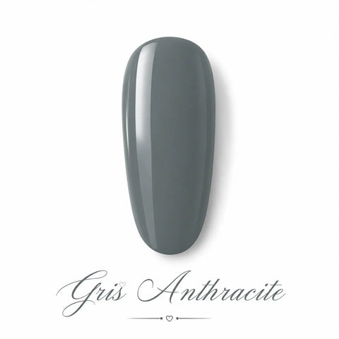 Capsule swatch vernis gel Gris Anthracite Beauty Distribution, teinte gris foncé élégante effet glossy, rendu packshot luxe sur fond blanc, couleur chic et moderne pour manucure professionnelle, nail art sophistiqué et pose UV/LED.
